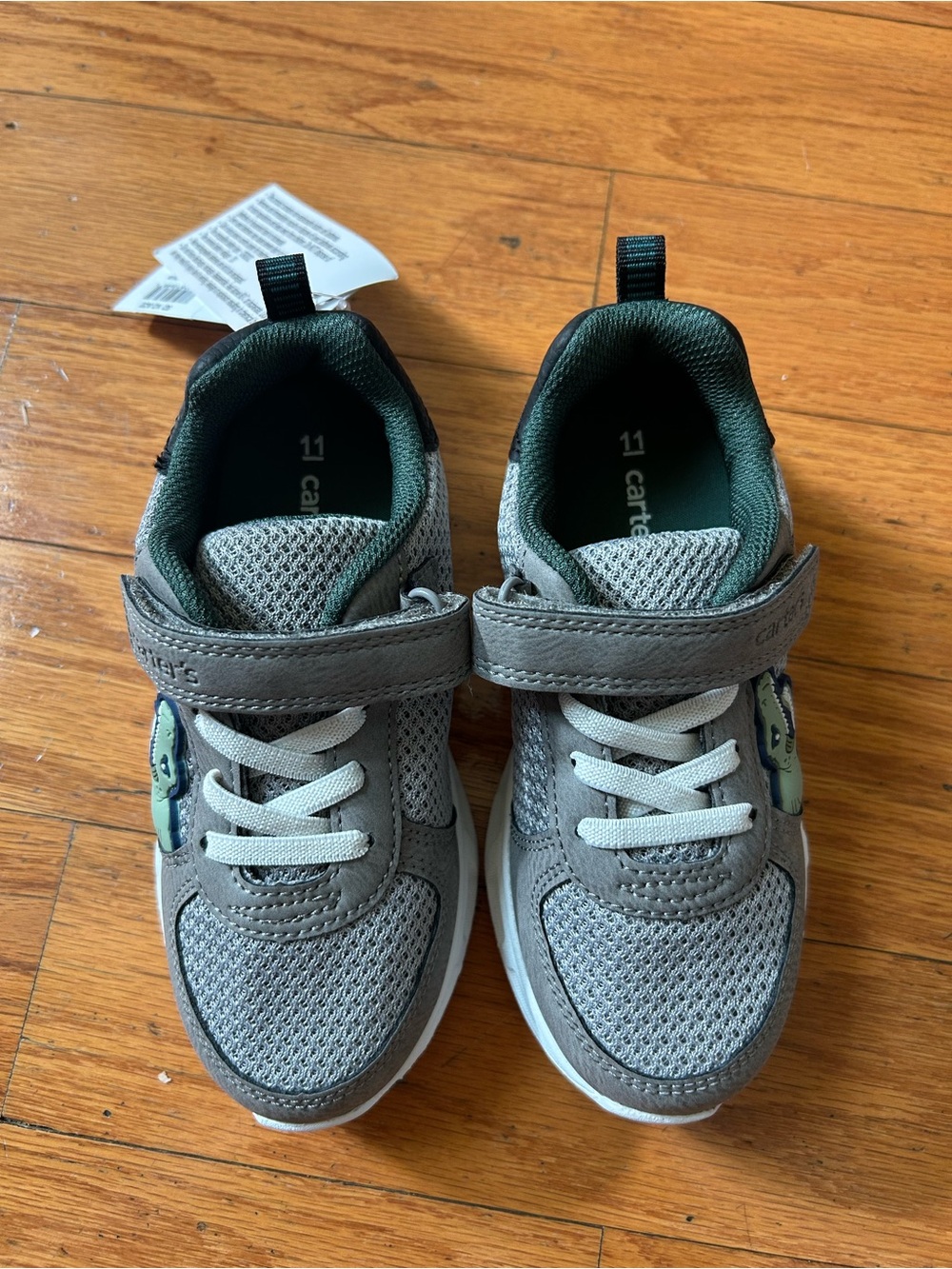 NWT Carter’s boys Dinosaur light up sneakers size 11